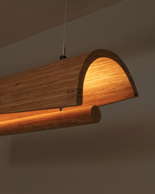 Hourglass pendant light styled room