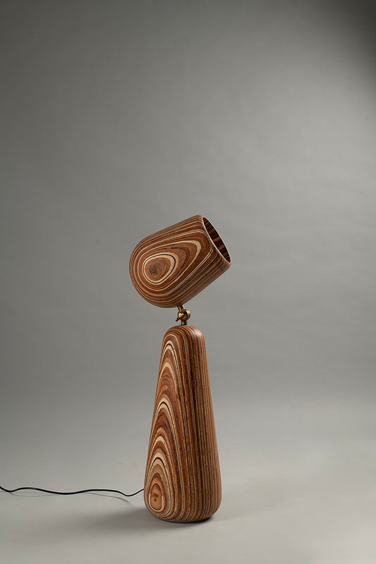 Wooden lamp with a unique design on a gray background