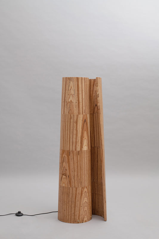Wooden lamp with a unique design on a gray background