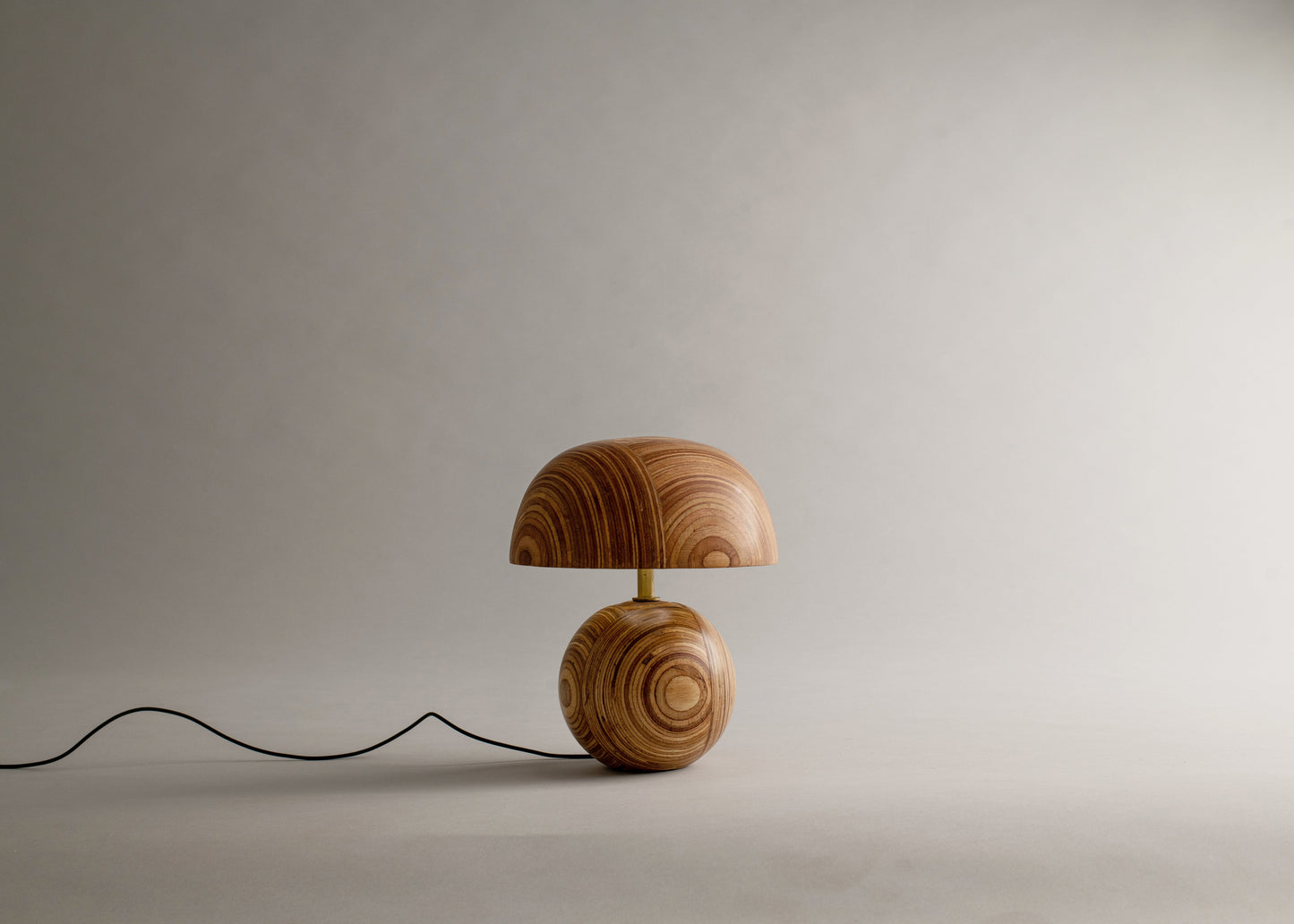 Wooden table lamp on a plain background